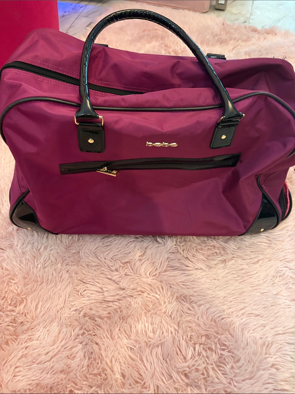 bebe Magenta Travel Weekender Bag with Black Trim